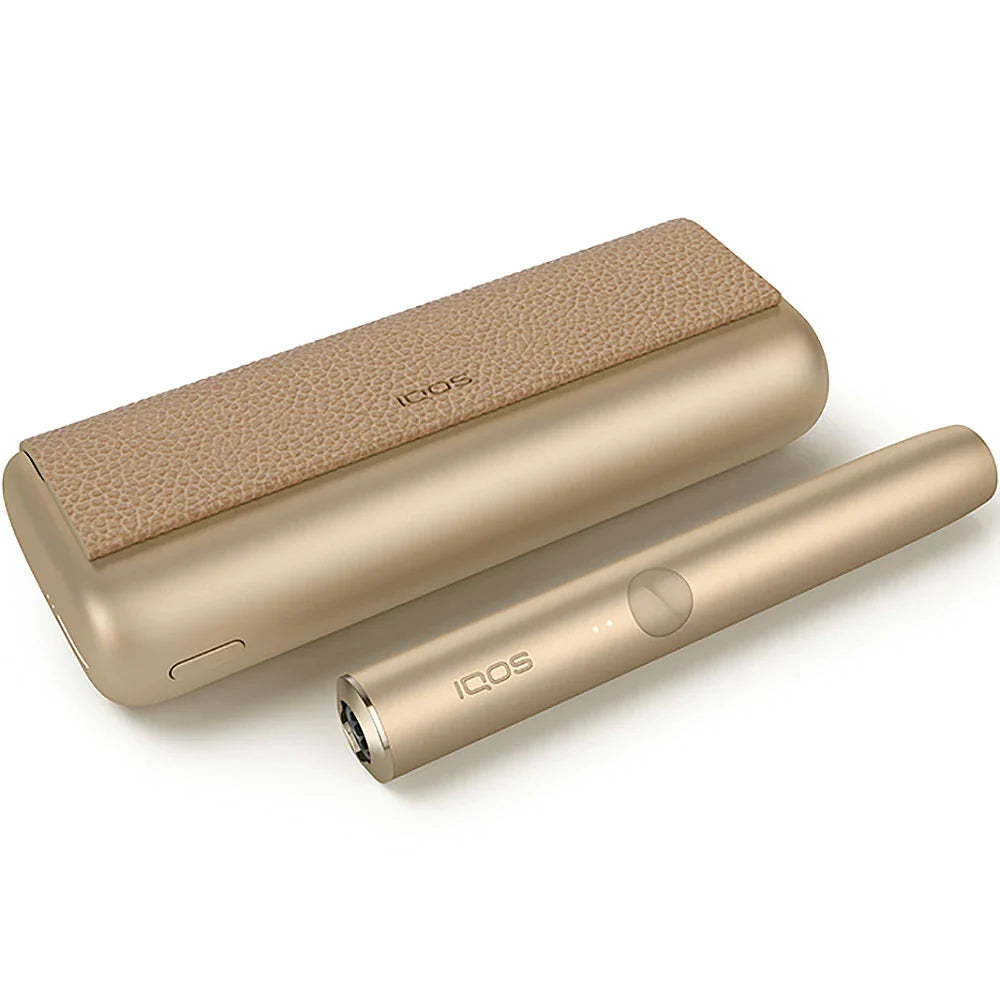 IQOS Iluma Prime gold khaki device with textured leather-style panel and button
