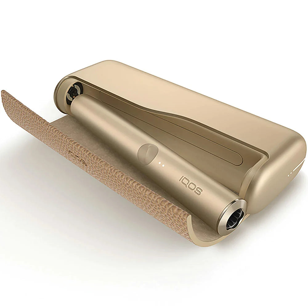 IQOS Iluma Prime gold khaki device cradle with open end and textured exterior