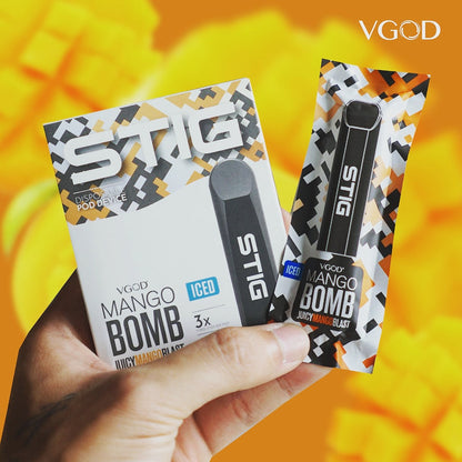 STIG disposable pod device 3-pack, ICED Mango Bomb flavor, hands holding boxed pods