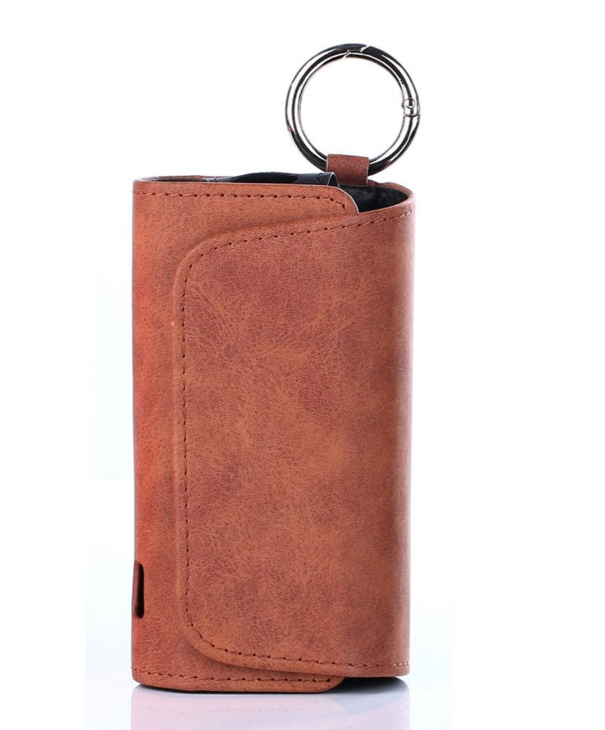 Brown flip-top case pouch holder with key ring and top flap.