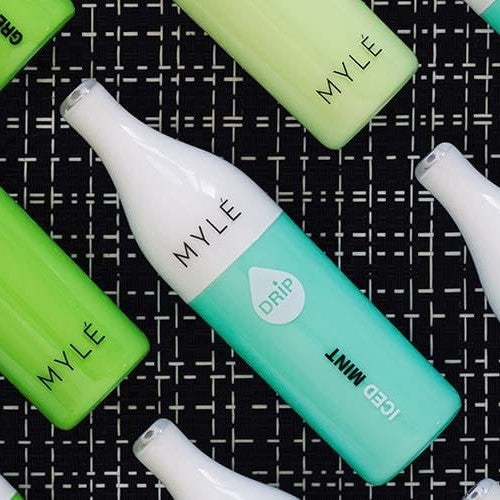Myle disposable vape devices with mint, green, and white cartridges